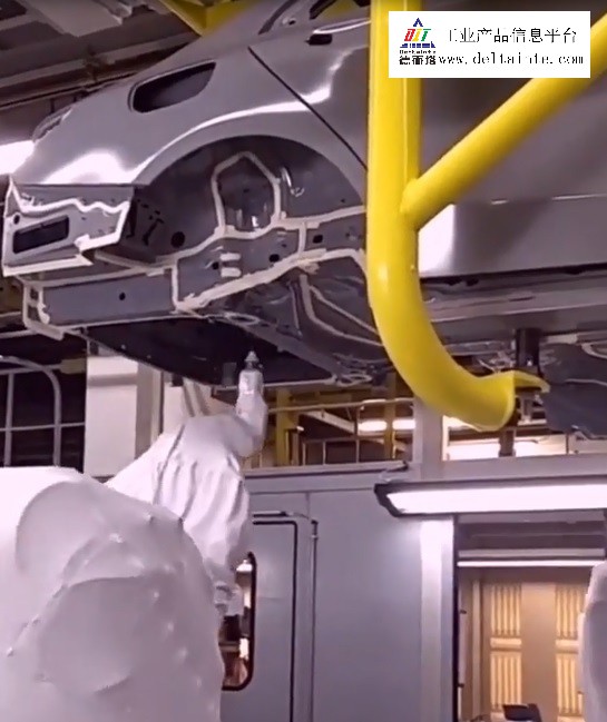 A video of industrial robots from China painting cars